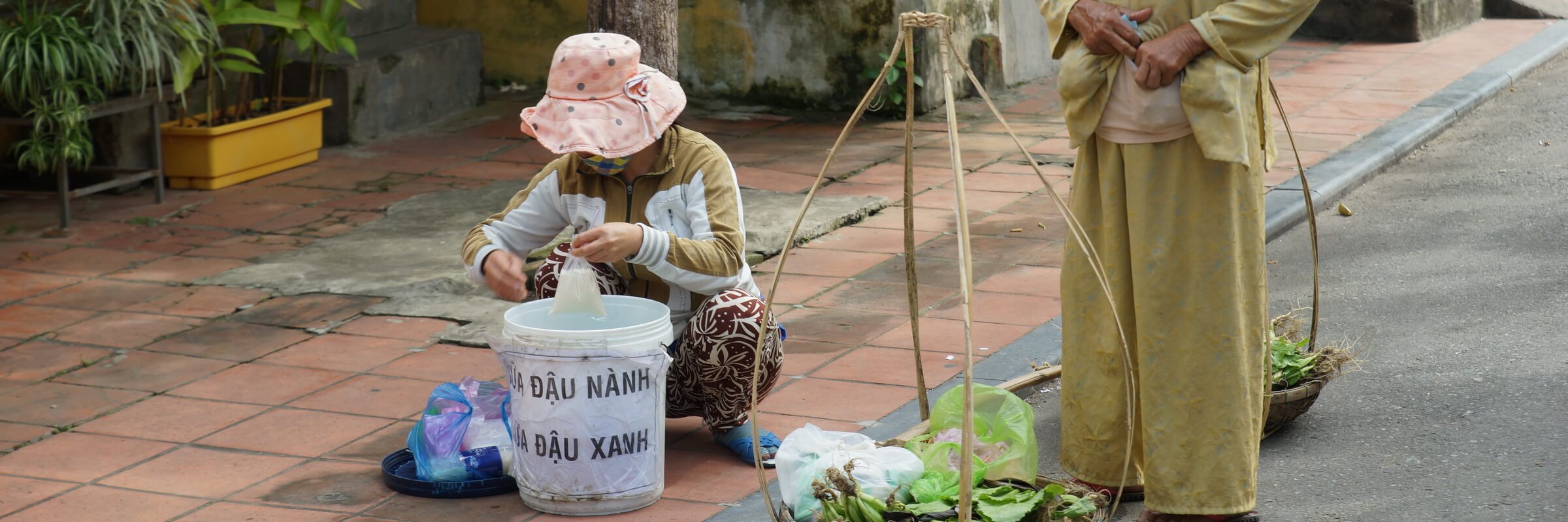 Obst- und Gemüseverkäuferinnen in Hoi An